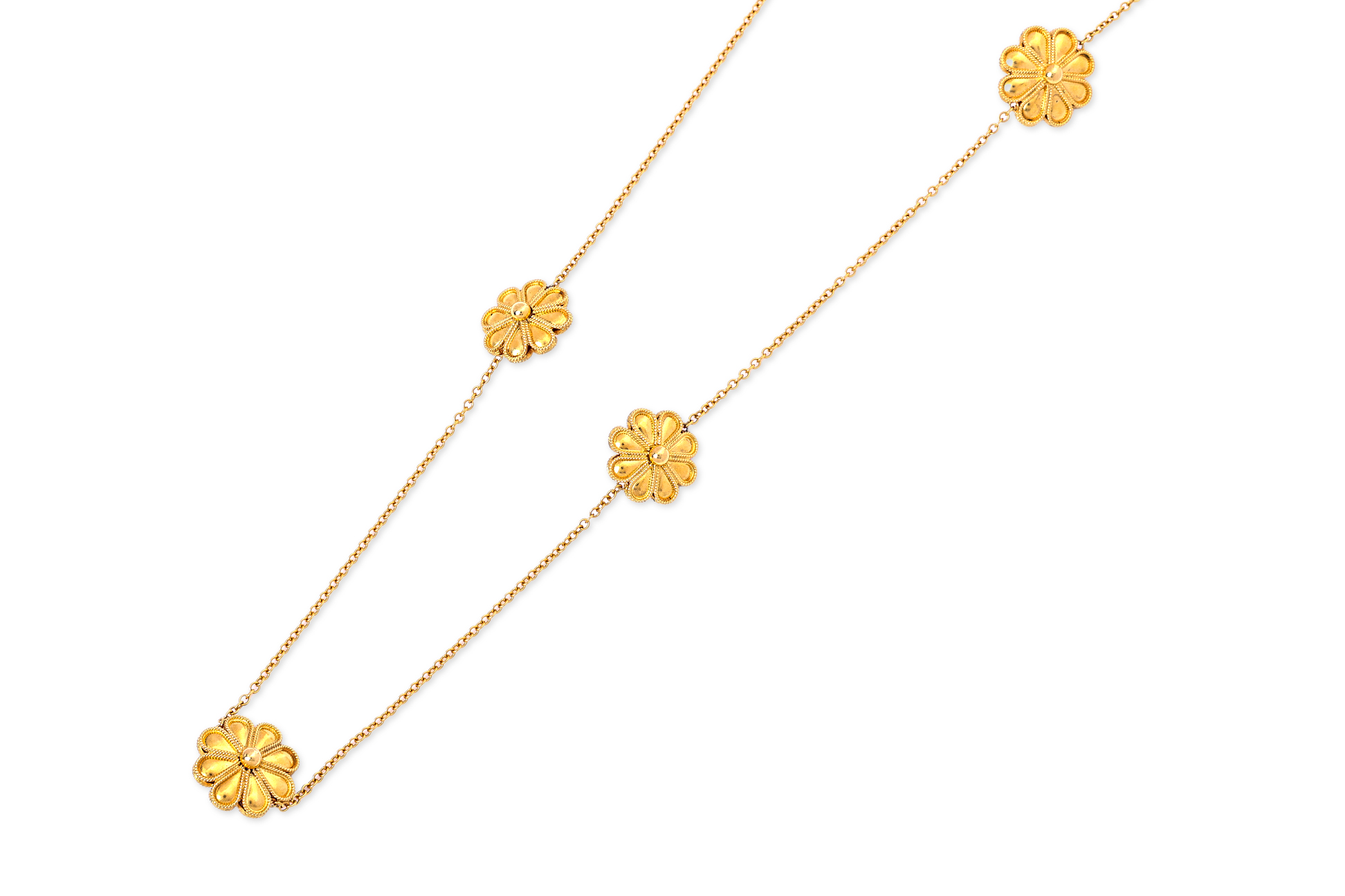 A LONG GOLD FLOWER NECKLACE