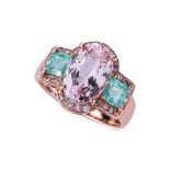 A MORGANITE, EMERALD AND DIAMOND RING