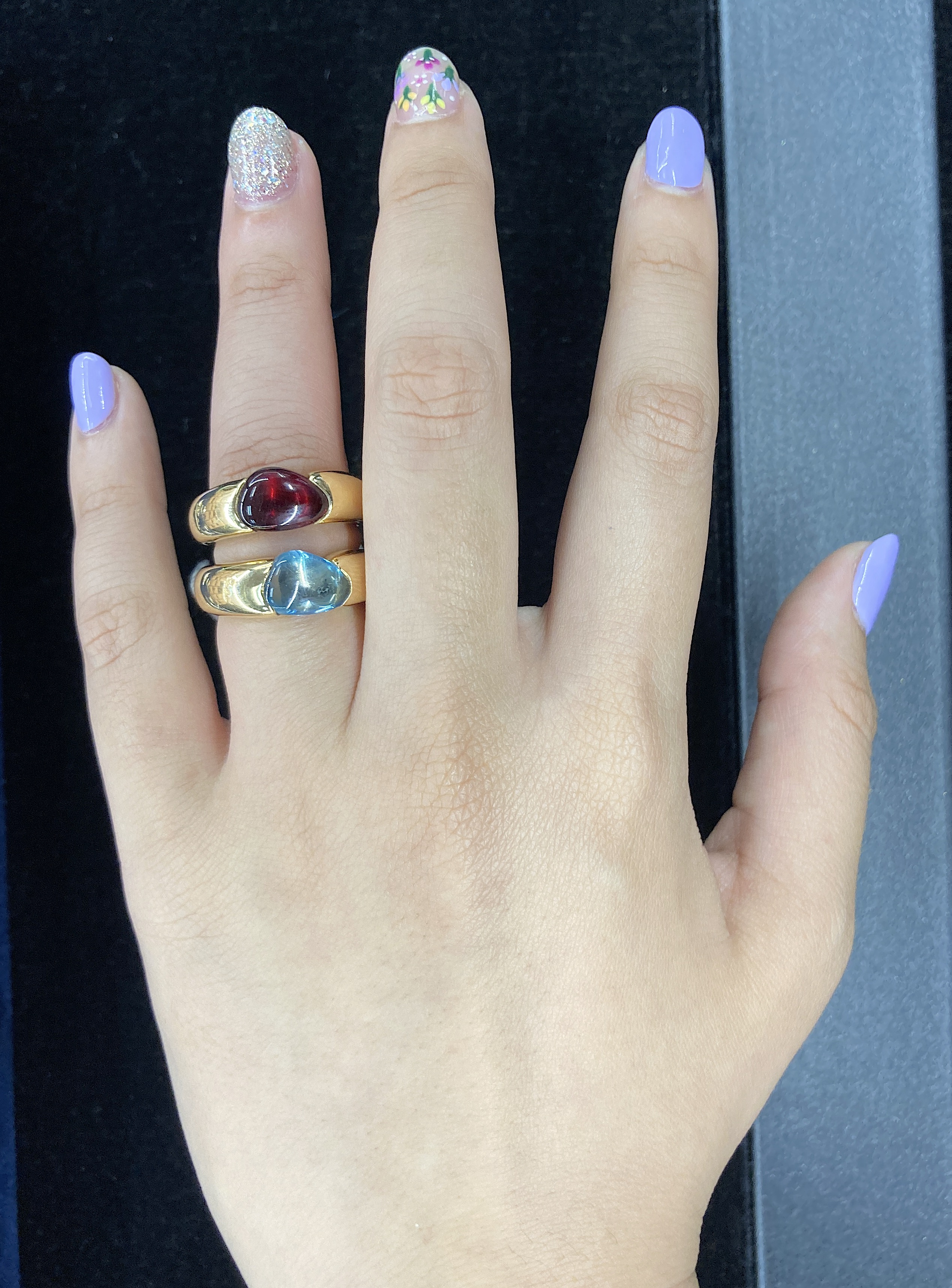 A PAIR OF TOPAZ AND GARNET RINGS BY POMELLATO - Image 6 of 6