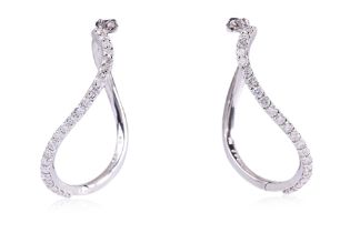 A PAIR OF DIAMOND HOOP EARRINGS