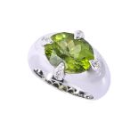 A PERIDOT AND DIAMOND RING