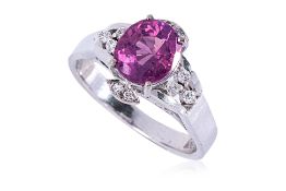 A PINK SAPPHIRE AND DIAMOND RING