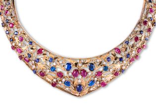 A LARGE MULTI-GEM HINGED CHOKER