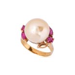 A CULTURED SOUTH SEA PEARL AND RUBY RING