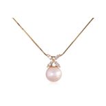 A CULTURED SOUTH SEA PEARL PENDANT BY TASAKI ON CHAIN