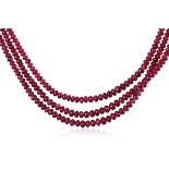 A THREE STRAND RED SPINEL BEADS NECKLACE