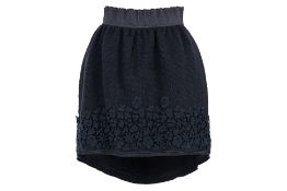 A DOLCE & GABBANA BLACK KNIT SKIRT WITH APPLIQUED FLOWERS