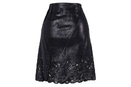 A CHRISTIAN DIOR PERFORATED LEATHER SKIRT