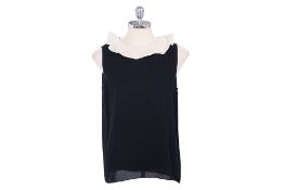 A LANVIN SLEEVELESS BLOUSE WITH SCALLOPED COLLAR
