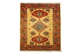 A KAZAK CREAM WOOL RUG (165 x 128)