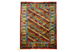 A MASHAD WOOL RUG (198 x 139cm)