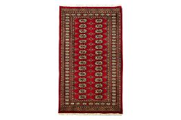 A BOKHARA STYLE WOOL HALL RUNNER (210 x 99cm)