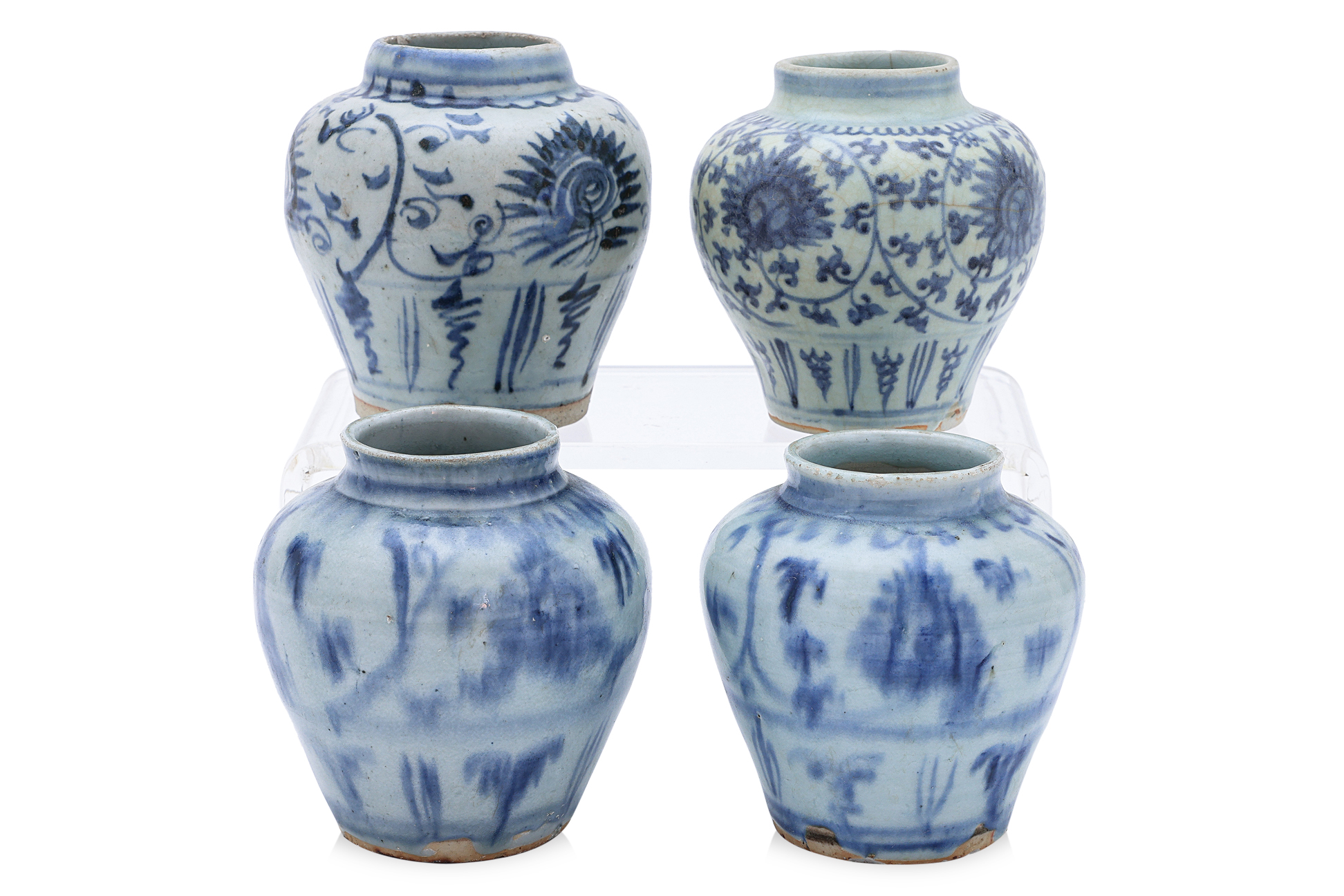 A GROUP OF FOUR BLUE AND WHITE LOTUS SCROLL JARS