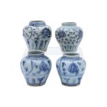A GROUP OF FOUR BLUE AND WHITE LOTUS SCROLL JARS