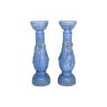 A PAIR OF VERY LARGE BLUE GLAZED DRAGON JARDINIERE STANDS