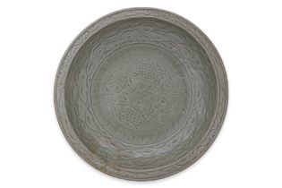 A LARGE CARVED LONGQUAN CELADON DISH