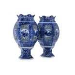 A PAIR OF BLUE AND WHITE RETICULATED PORCELAIN LANTERNS