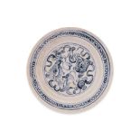 A BLUE AND WHITE FOO LION DECORATED DISH