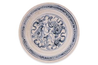 A BLUE AND WHITE FOO LION DECORATED DISH