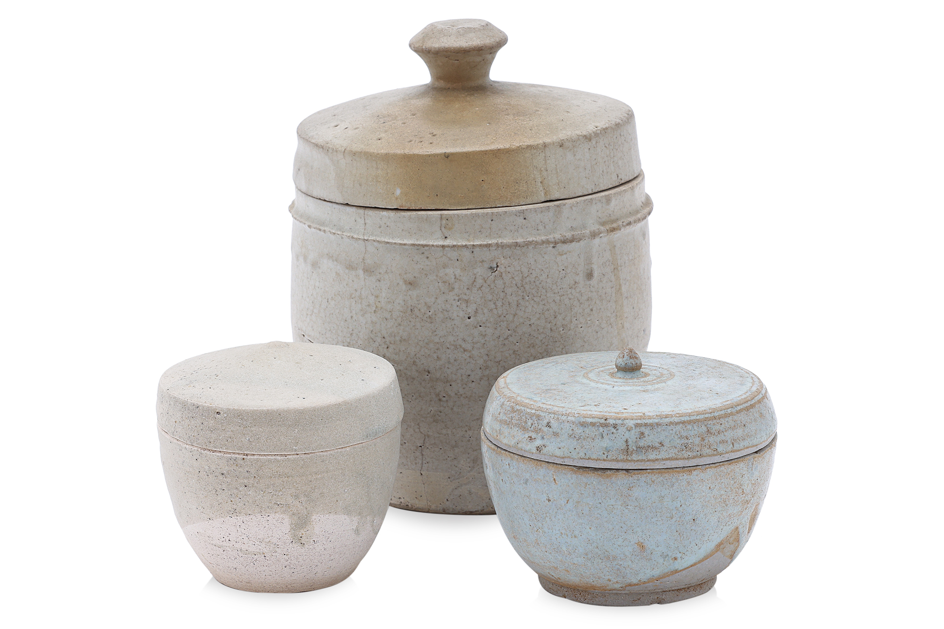 A GROUP OF THREE SOUTH-EAST ASIAN JARS AND COVERS