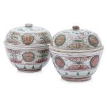 A PAIR OF SWATOW PORCELAIN BOWLS AND COVERS