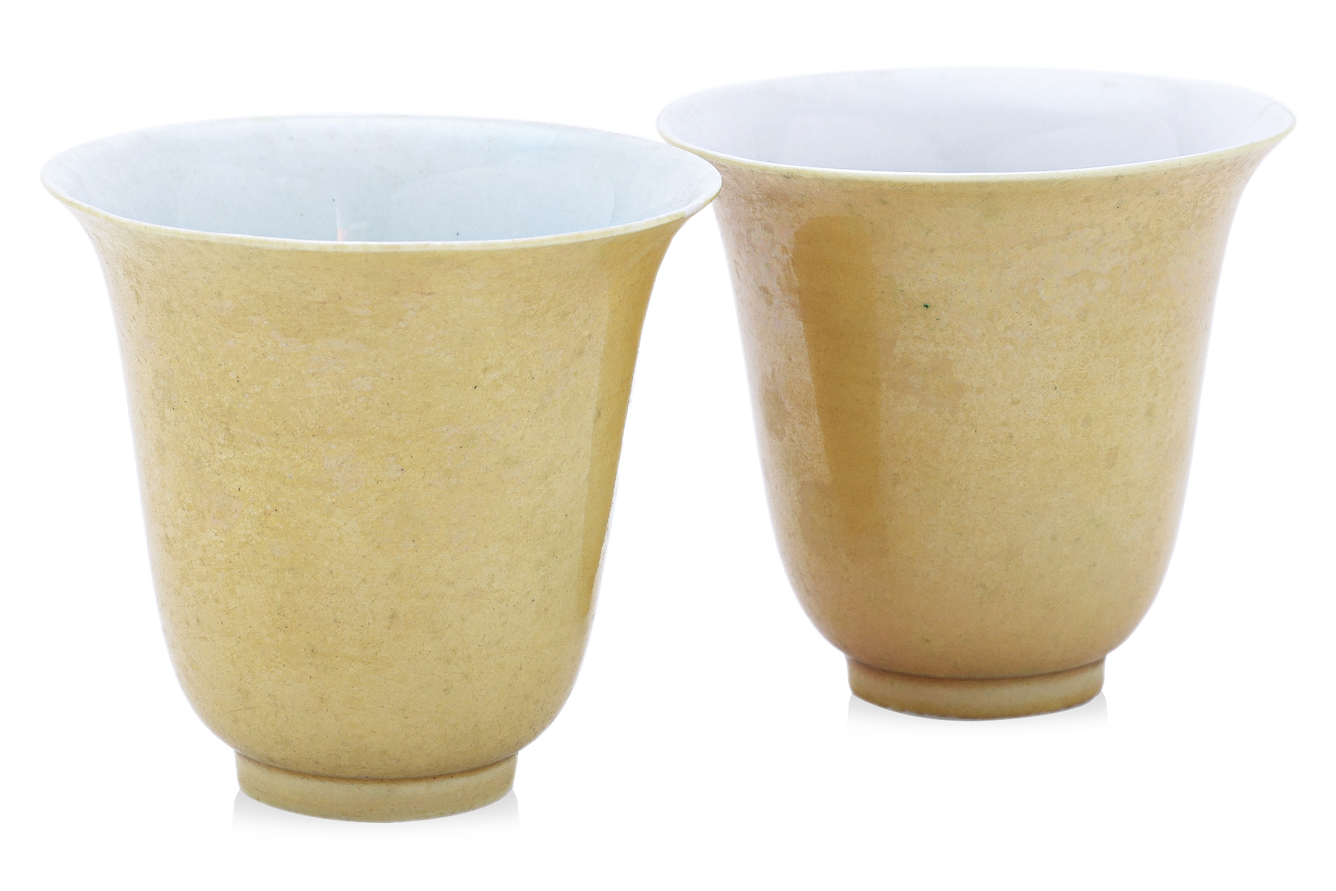 A PAIR OF YELLOW-GLAZED TEA CUPS