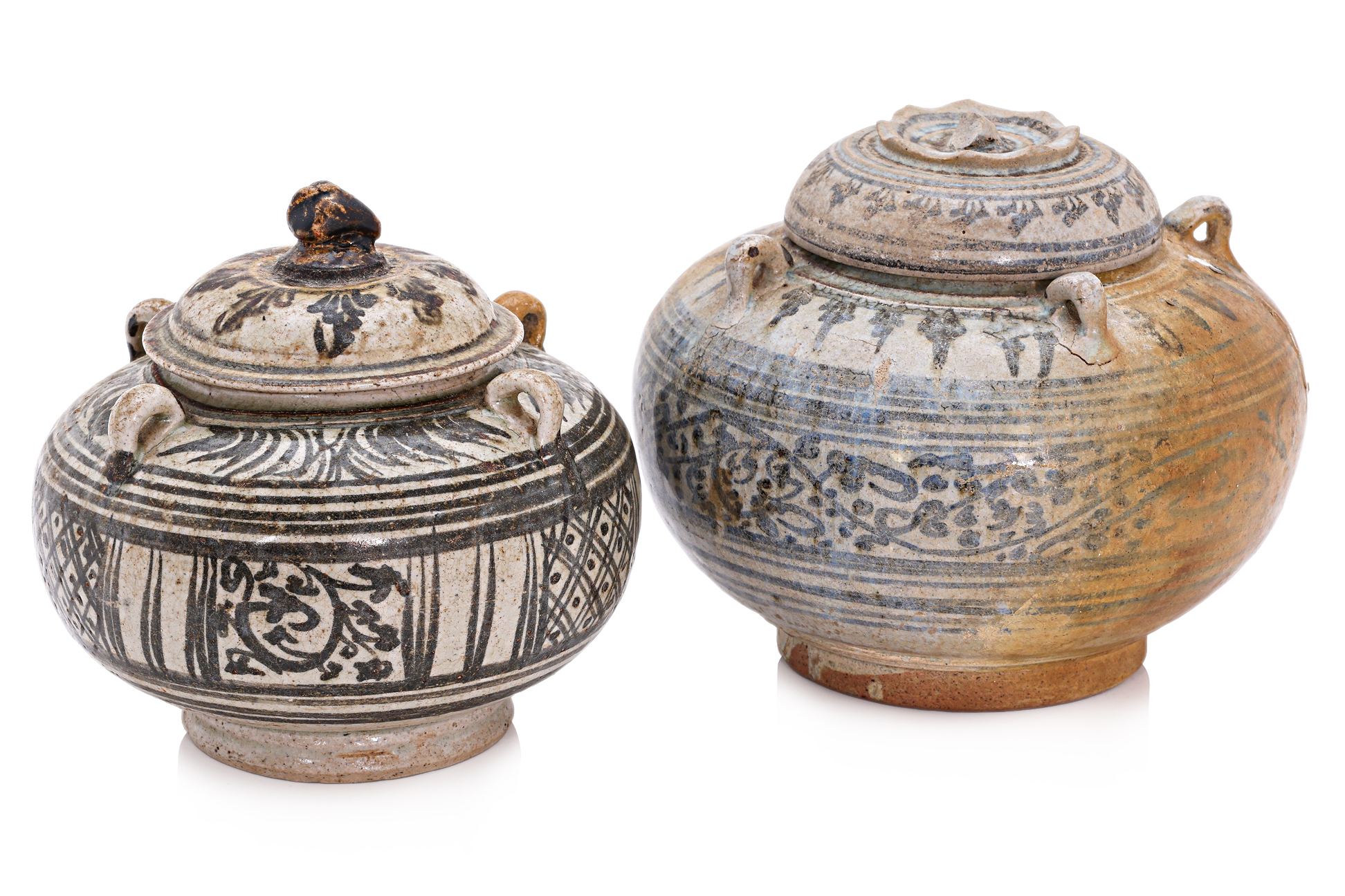 A GROUP OF TWO THAI JARS AND TWO COVERS