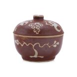 A SWATOW SLIP DECORATED BROWN GLAZED BOWL AND COVER