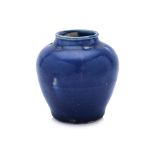 A MONOCHROME BLUE GLAZED JAR