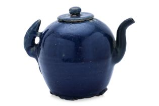 A MONOCHROME BLUE-GLAZED WINE POT WITH MOUSE HANDLE