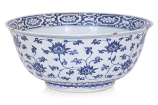 A LARGE BLUE AND WHITE LOTUS AND FRUIT BOWL