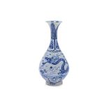 A VIETNAMESE BLUE AND WHITE PEAR SHAPED DRAGON VASE