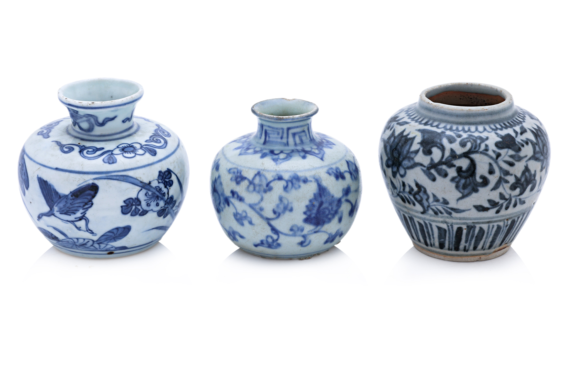 A GROUP OF THREE SMALL BLUE AND WHITE JARS