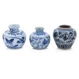 A GROUP OF THREE SMALL BLUE AND WHITE JARS