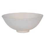 A WHITE GLAZED MOULDED THREE FLOWERS BOWL