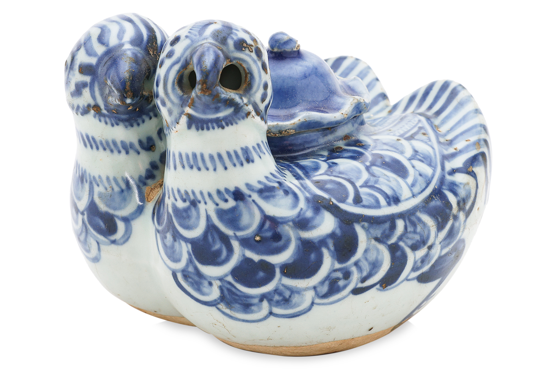 A BLUE AND WHITE TWIN DUCK WATER DROPPER AND COVER