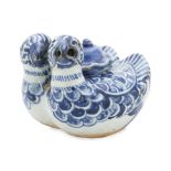 A BLUE AND WHITE TWIN DUCK WATER DROPPER AND COVER