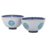 TWO BLUE AND WHITE AND ENAMELLED BOWLS