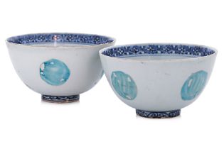TWO BLUE AND WHITE AND ENAMELLED BOWLS