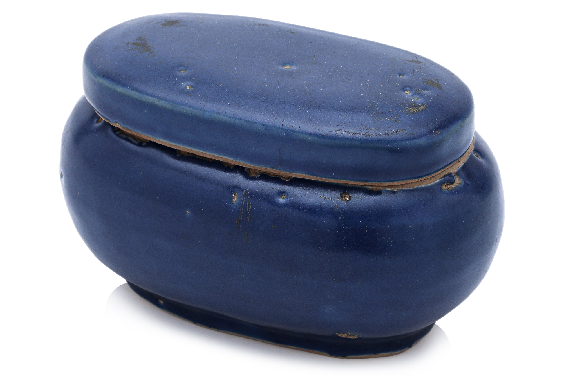 A MONOCHROME BLUE-GLAZED OVAL BOX, COVER AND LINER