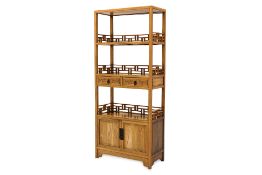 A CHINESE ELM OPEN BOOKCASE