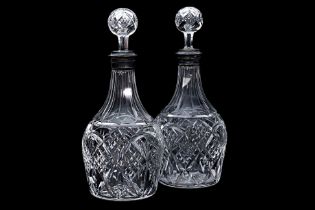 A PAIR OF SILVER MOUNTED EDINBURGH CRYSTAL DECANTERS