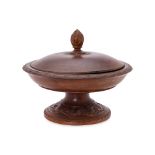 AN INDONESIAN CARVED WOOD PEDESTAL DISH AND COVER