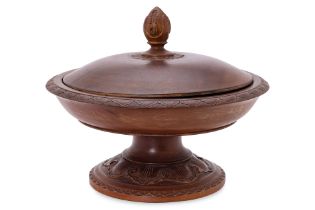 AN INDONESIAN CARVED WOOD PEDESTAL DISH AND COVER