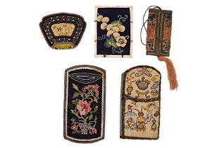 FOUR SILK EMBROIDERED PURSES AND A KEY HOLDER