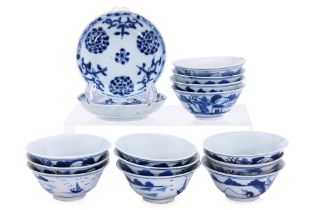 A GROUP OF BLUE AND WHITE PORCELAIN TEA BOWLS AND SAUCERS