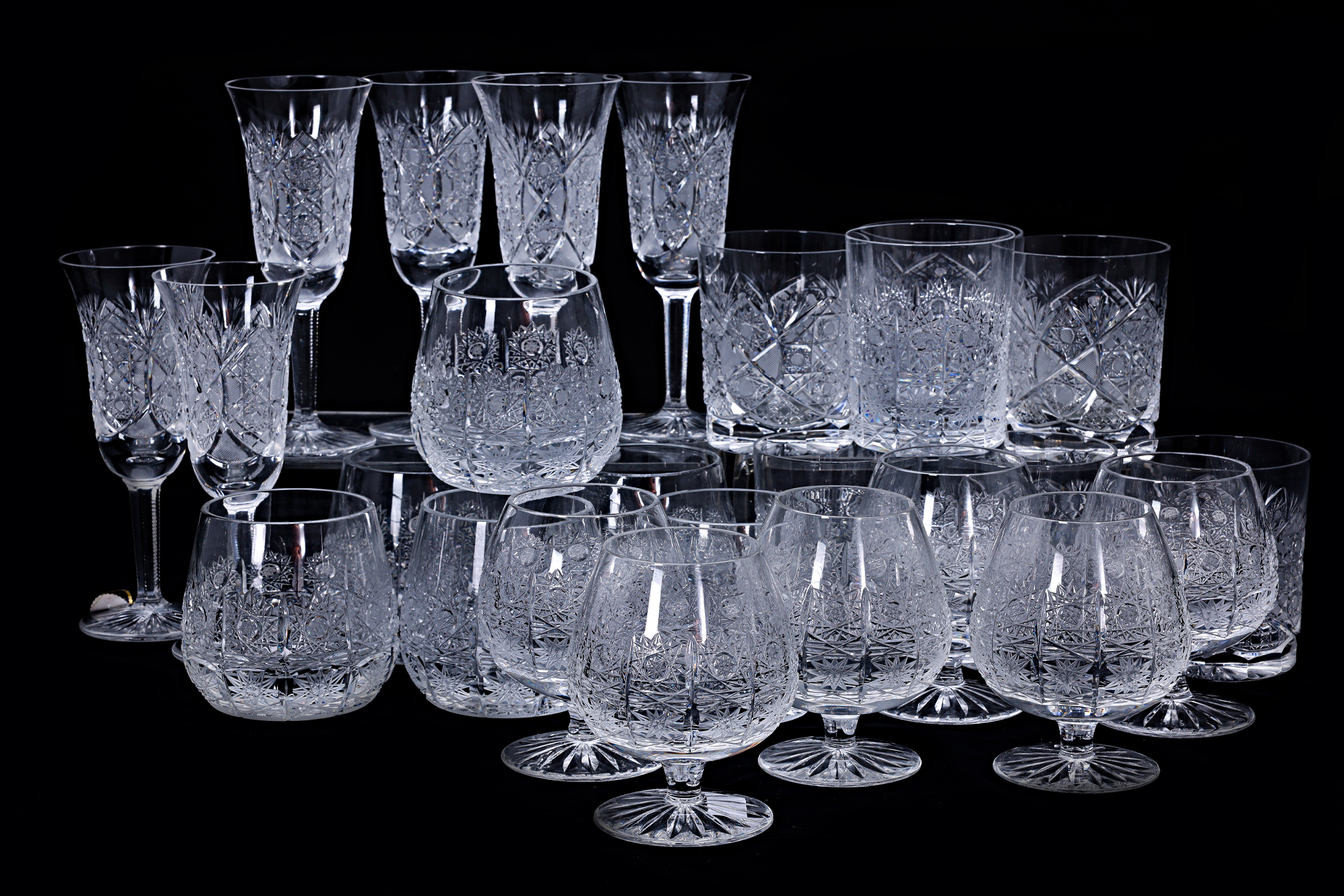 FOUR SETS OF BOHEMIA CRYSTAL GLASSES