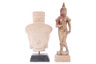TWO CAMBODIAN CARVED STONE FIGURES
