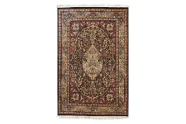 A PAKISTANI KERMAN WOOL RUG (218 x 139 CM)