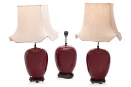 A SET OF THREE SANG DE BOEUF GLAZED TABLE LAMPS